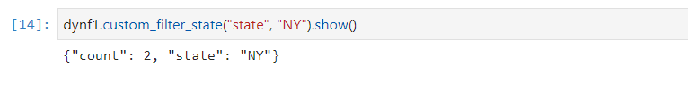 The screenshot shows a cell in a AWS Glue notebook with the arguments passed to the dynamicFrame.show function.